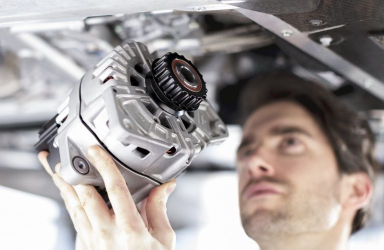 Technician working on a vehicle